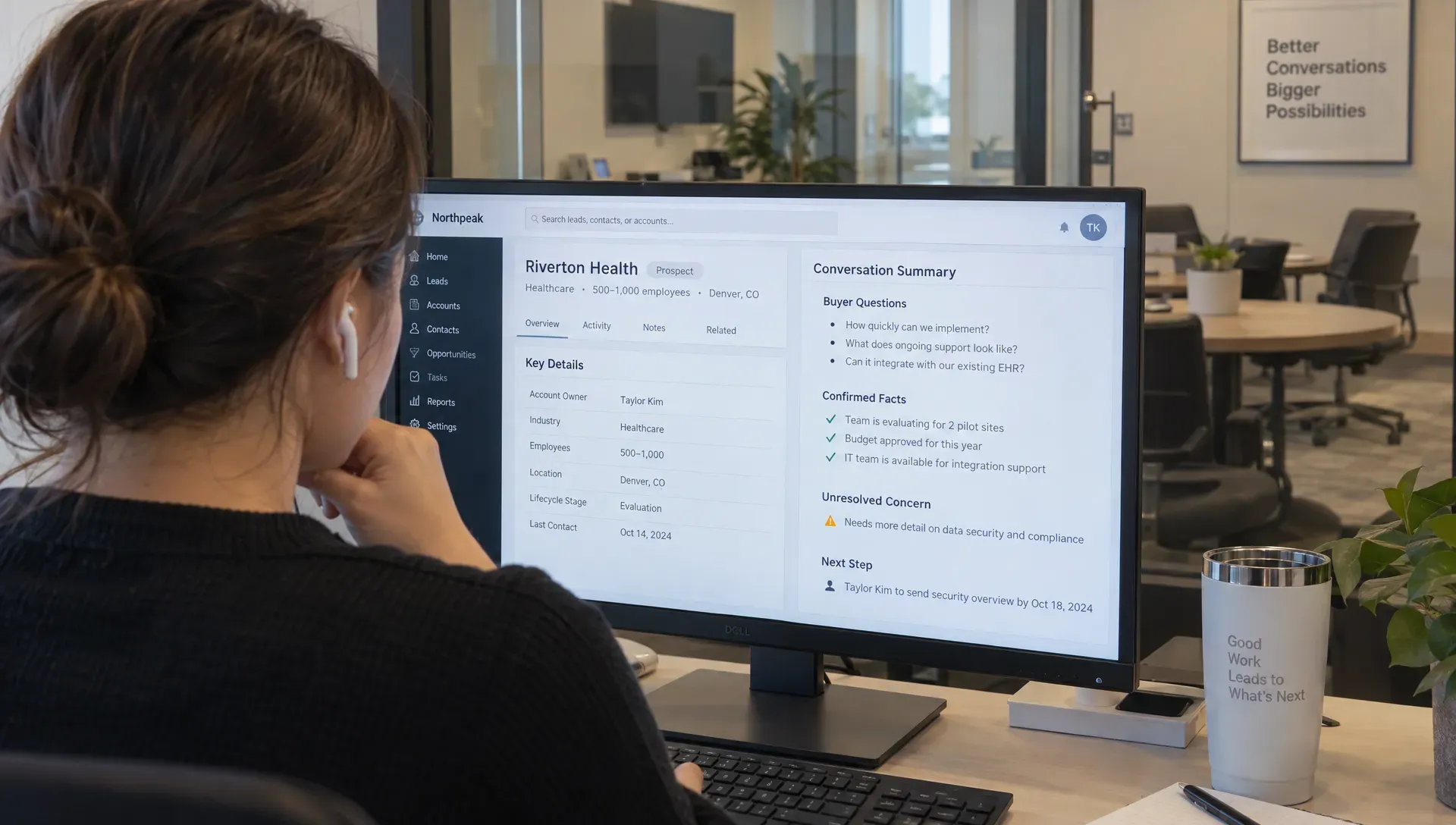 An account executive checks a buyer’s questions, confirmed details and open concern before a B2B sales meeting.